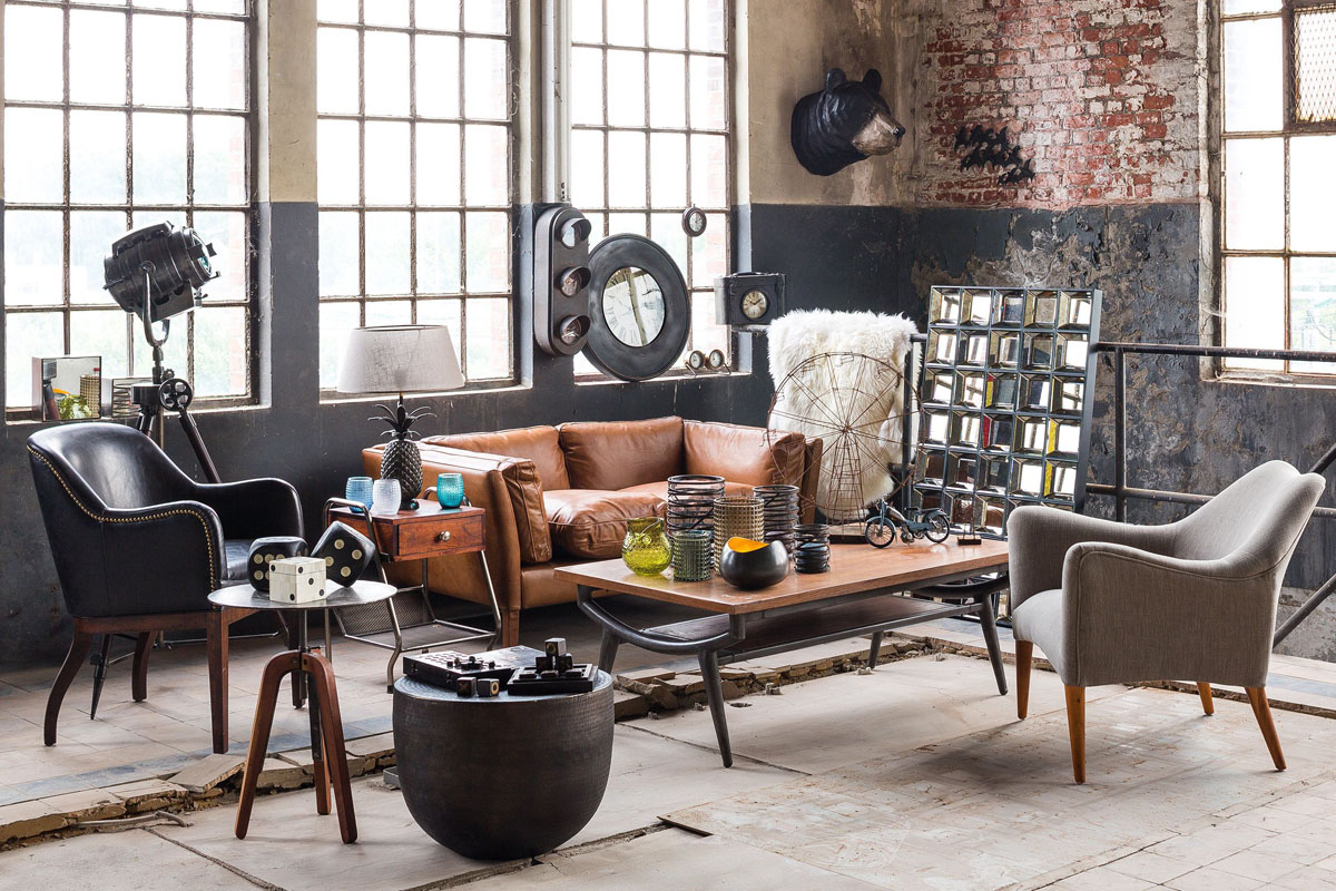 Industrialny szyk 2026 Mieszkanie w stylu industrialnym 2026: cegła, metal, komfort i elegancja.