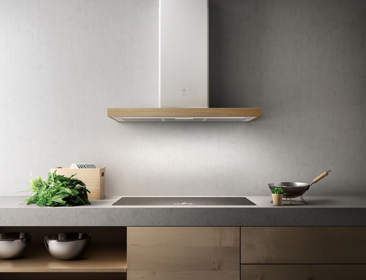 Okap: Klimat Country w Kuchni Rustykalna kuchnia z okapem w stylu country i drewnianymi meblami.