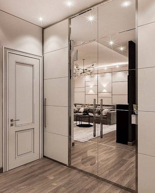 Nierówne ściany? Poradzimy! Sposoby na zamaskowanie nierównych ścian podczas montażu szafy na wymiar.