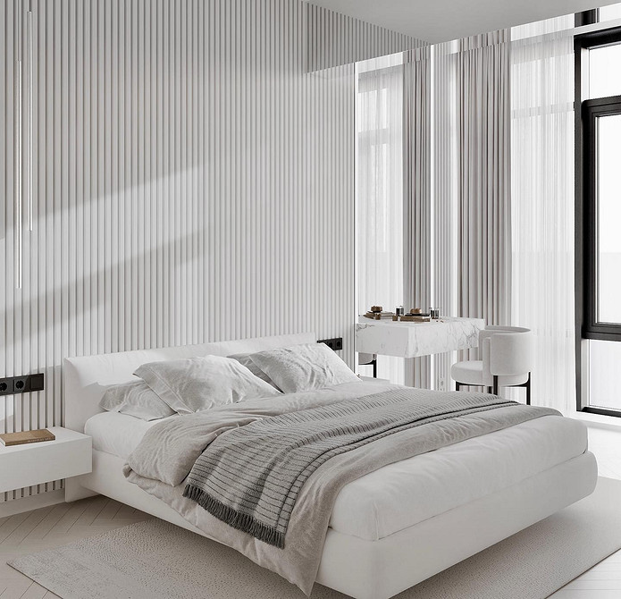 Różowy akcent Biała sypialnia z różową pościelą jako mocny akcent kolorystyczny. Romantyczny wystrój.