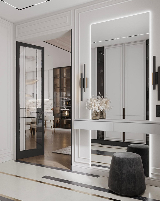 Kolorowy akcent Białe meble w sypialni z kolorowym dywanem dodającym wnętrzu indywidualnego charakteru.