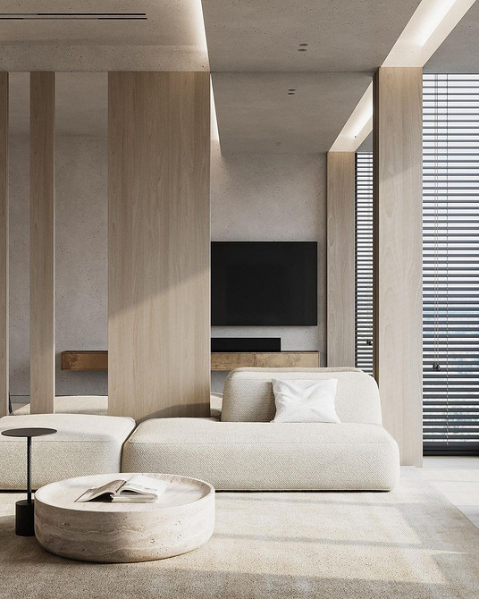 Beżowy relaks: Kącik czytania Beżowa sofa z poduszkami w różnych odcieniach, przytulny kącik do czytania, lampa podłogowa.