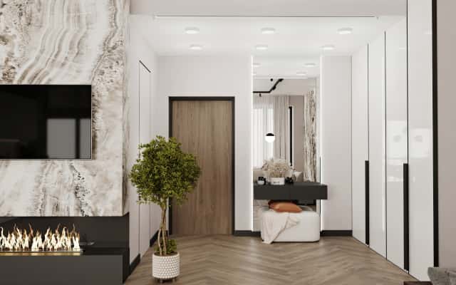 Beżowy komfort Przytulny beżowo-brązowy pokój dzienny w trzypokojowym mieszkaniu z tekstyliami.