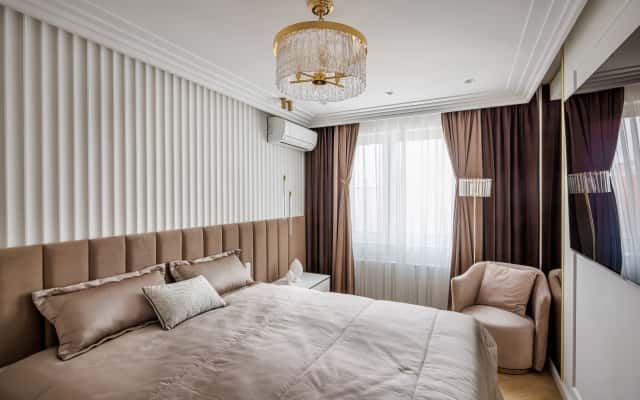 Luksusowa kuchnia z wyspą, marmurowymi blatami i eleganckimi wykończeniami w 2026 roku.