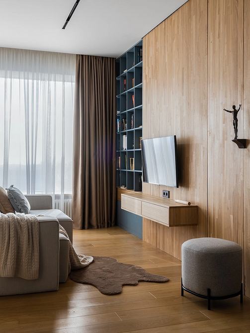 Aranżacja kuchni z salonem 2026: stylowe meble podkreślające indywidualność w małym mieszkaniu.