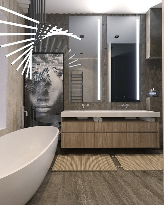 Elegancja w detalu Elegancka łazienka z dużym lustrem, minimalistycznymi szafkami i subtelnym oświetleniem LED.