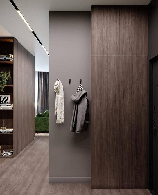 Jasna szafa skandynawska Jasna szafa uchylna do przedpokoju z otwartymi półkami na dekoracje w stylu skandynawskim.