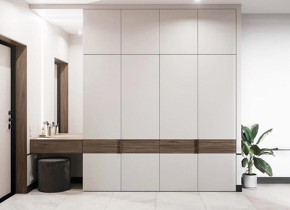 Szafa na odzież wierzchnią Designerska szafa w przedpokoju: idealne miejsce do przechowywania odzieży wierzchniej.