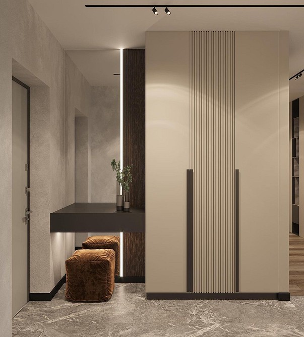 Jasna szafa minimalistyczna Jasna szafa do przedpokoju o minimalistycznym designie i wygodnych uchwytach