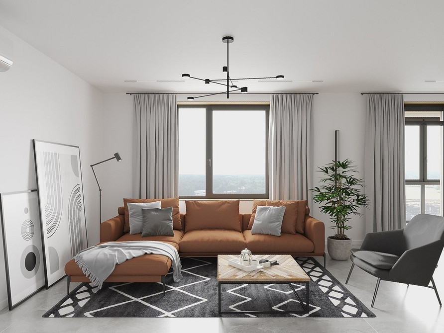 Komfortowy brąz Przytulna brązowa sofa w ciepłym wnętrzu. Odcienie brązu dla komfortu.