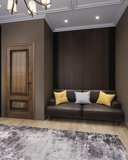 Narożnik w brązie Brązowa sofa narożna w salonie, optymalne wykorzystanie przestrzeni i komfort użytkowania.