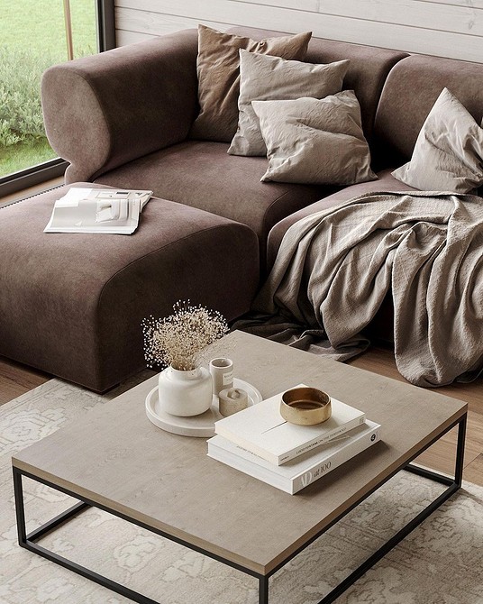 Sofa: Raj dla dziecka Brązowa sofa w pokoju dziecięcym: bezpieczne i wygodne miejsce do zabawy i odpoczynku.