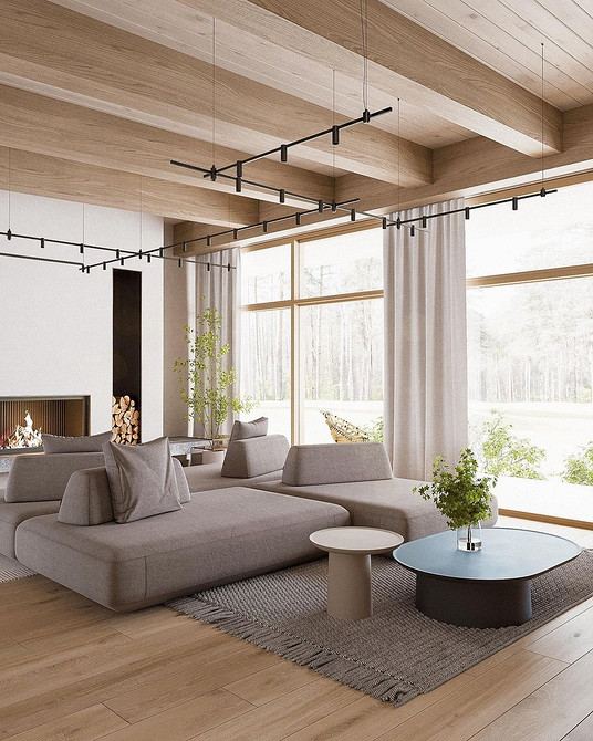 Loft i brąz: Idealne połączenie Brązowa sofa z poduszkami w nowoczesnym pokoju dziennym w stylu loft 2026.