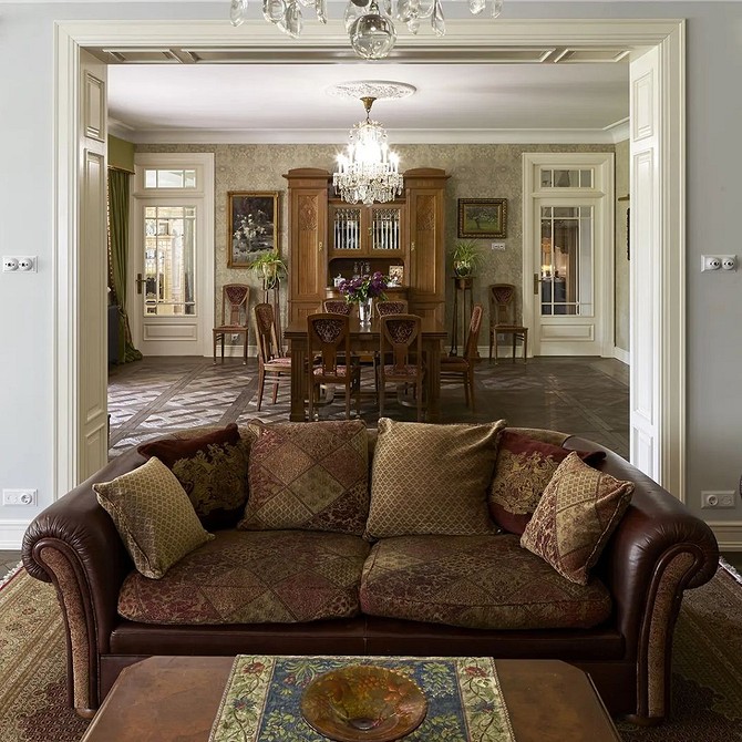 Welurowa sofa: Elegancja Elegancka brązowa sofa z welurową tapicerką w aranżacji stylu loft 2026.