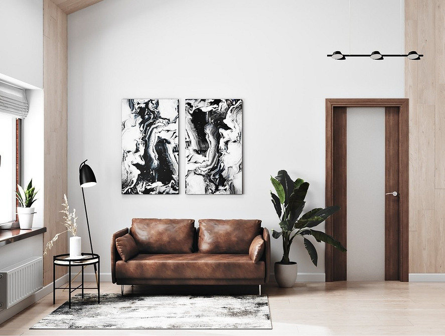 Brązowy akcent Brązowa sofa jako centralny element. Przytulny salon z paletą brązów.