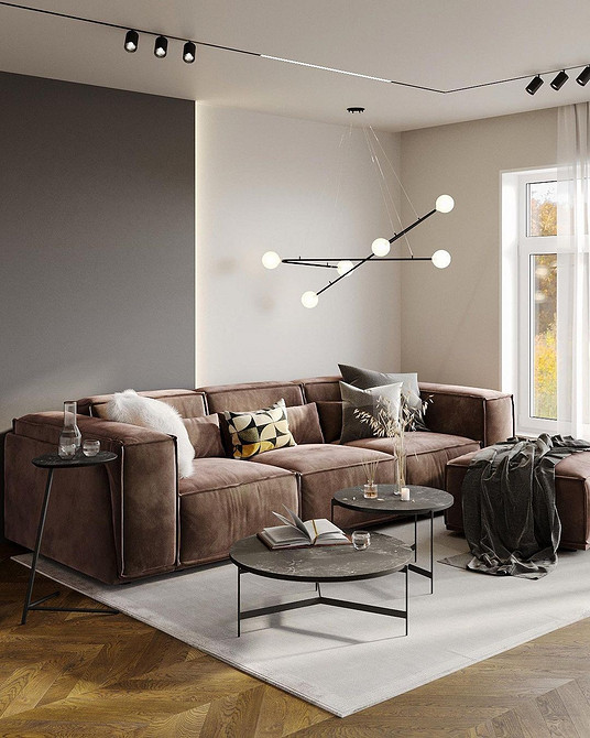 Modułowa wygoda Brązowa modułowa sofa w dużej salonie, zapewniająca elastyczność w aranżacji. Wygoda.