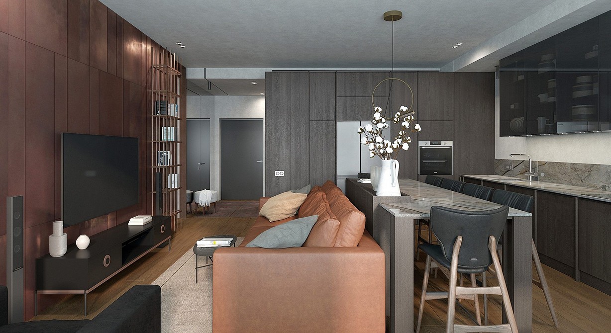 Przestrzeń i brąz Duża brązowa sofa w przestronnym salonie. Akcent na paletę kolorów ziemi.