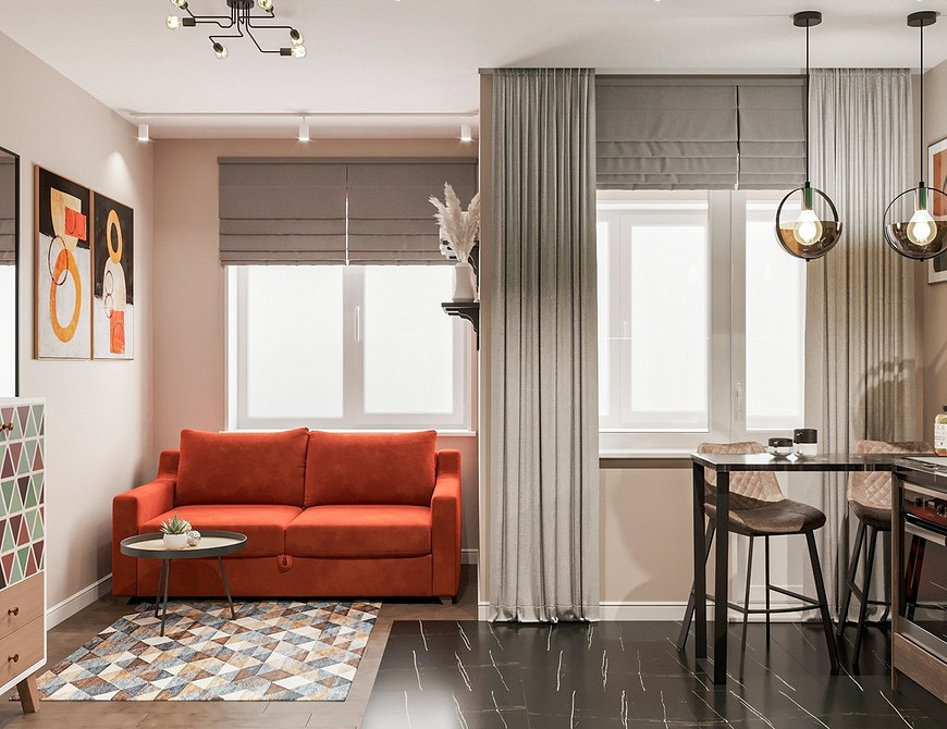 Sofa: Wybór i aranżacja Czerwona sofa w salonie. Inspiracje i porady dotyczące wyboru i ustawienia sofy.