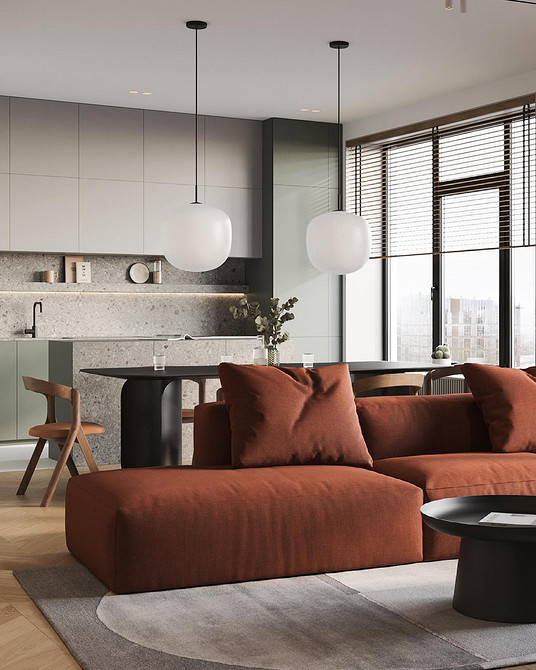 Czerwona sofa: stylowy element dekoracyjny we wnętrzu salonu.