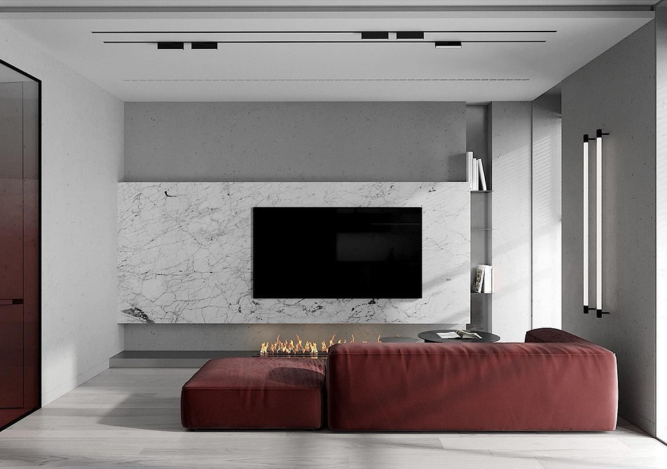 Stylowy salon z czerwoną sofą i jasnymi akcentami dekoracyjnymi. Nowoczesny design 2026.