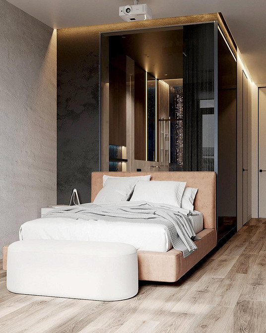 Przytulna nowoczesność Nowoczesna sypialnia z łóżkiem z miękkim zagłówkiem i dekoracyjnymi poduszkami dla przytulności.