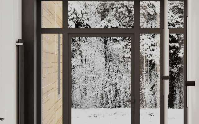 Kącik Relaksu Przytulny kącik do czytania w domu z wygodnym fotelem i naturalnym światłem.