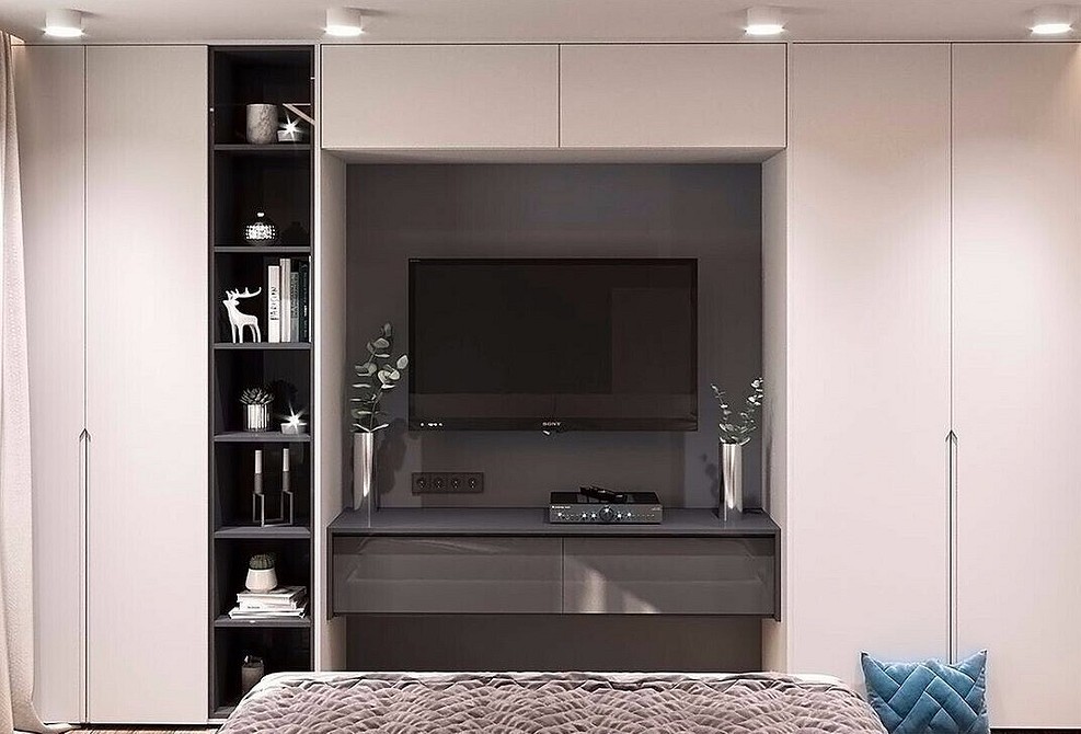 Geometryczna nisza TV Nowoczesny design niszy pod telewizor z geometrycznymi akcentami w aranżacji wnętrza.