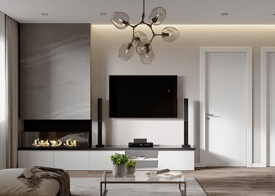 Minimalistyczna nisza pod telewizor z drewnianymi elementami w małym salonie. Aranżacja 2026.