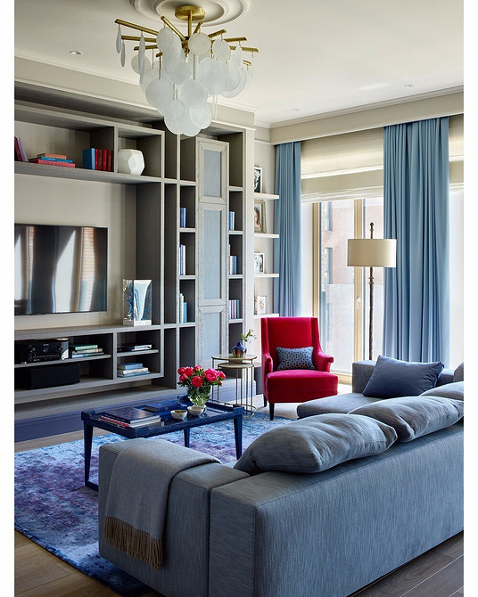 Kamień i światło Stylowy telewizor w szafie z kamieniem dekoracyjnym i podświetleniem w salonie 2026.