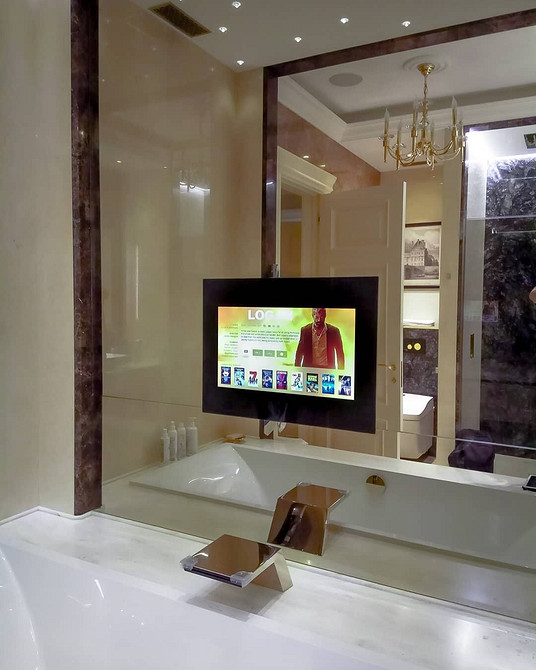 Nowoczesny design niszy dla telewizora w salonie z dekoracyjnym oświetleniem – inspiracja 2026.