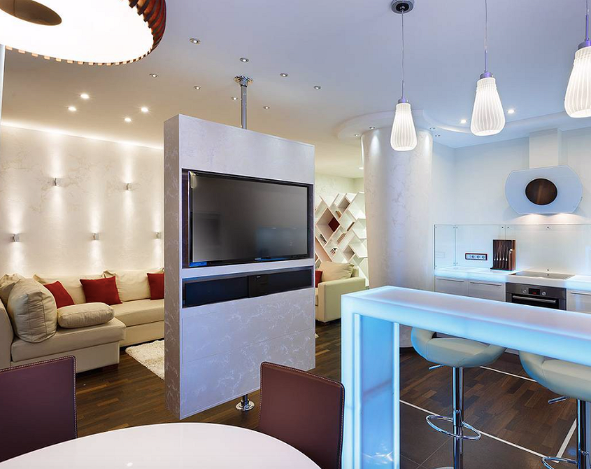 Podświetlona nisza TV Nowoczesny salon z telewizorem w stylowej niszy z podświetleniem w 2026 roku.