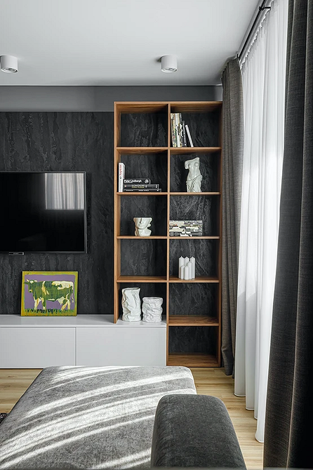 Stylowe półki do salonu Nowoczesne półki w salonie dodają stylu i funkcjonalności w małym apartamencie