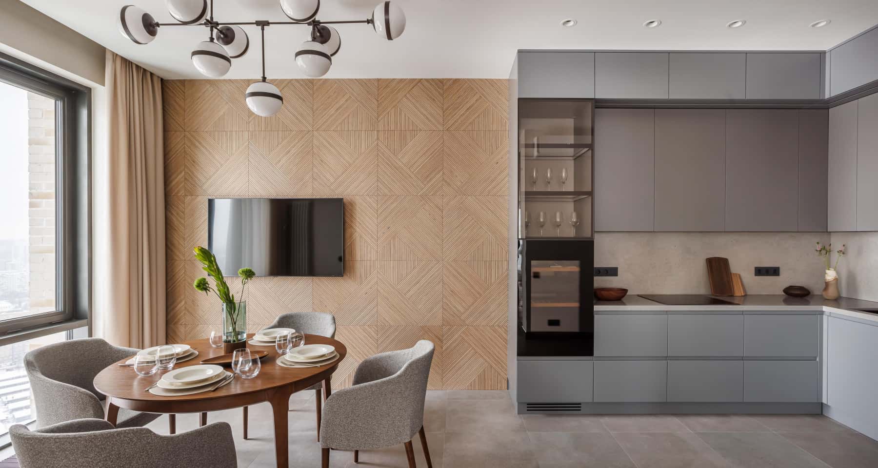 Minimalizm i beton Szaro-brązowy salon w stylu nowoczesnym z betonowymi ścianami i minimalistycznym wystrojem.