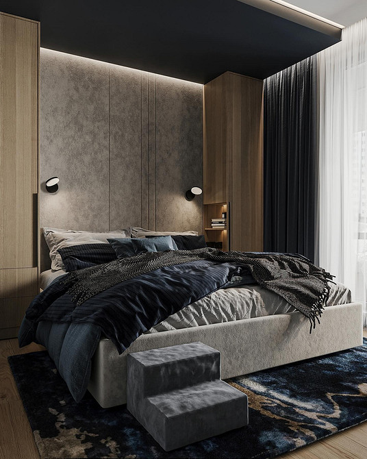 Komfortowe szare łóżko Komfortowe szare łóżko z miękkim zagłówkiem i dekoracyjnymi poduszkami w sypialni.