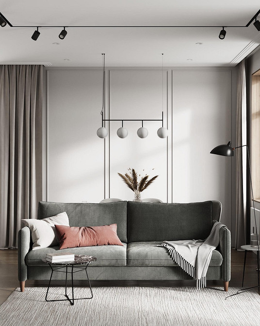 Aksamit i drewno Szare krzesła z aksamitnym obiciem wokół drewnianego stołu: nowoczesna jadalnia w 2026 roku.