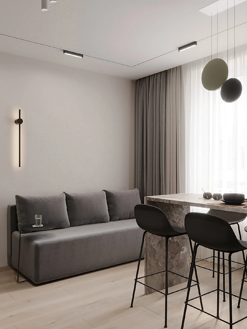 Minimalizm w małym Prosta szara sofa w minimalistycznym stylu idealna do małego mieszkania 2026