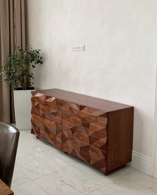 Elegancja i Styl Elegancka szafka RTV w nowoczesnym salonie. Minimalistyczny design 2026 i styl.