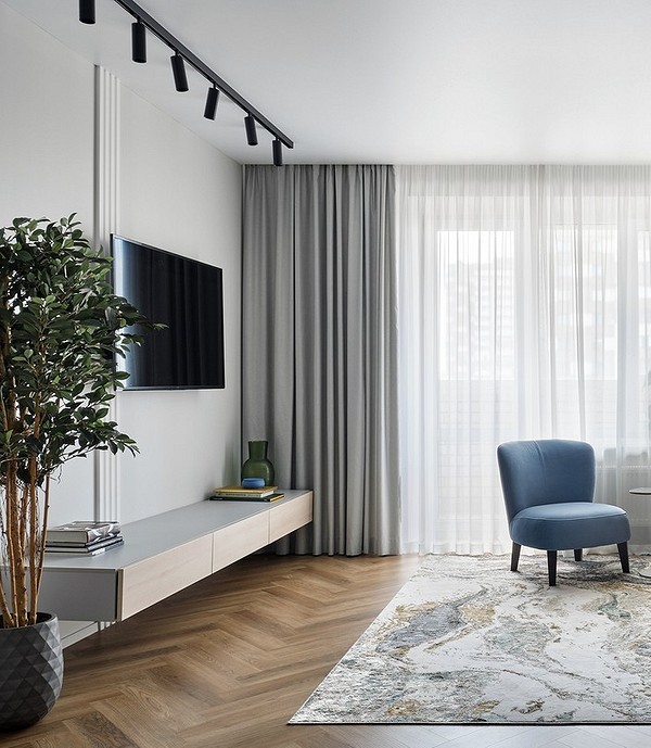 Minimalistyczna szafka RTV Szafka RTV w nowoczesnym salonie o minimalistycznym designie.