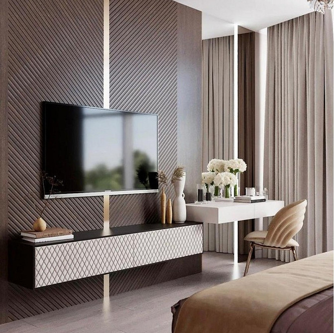 Funkcjonalna szafka RTV Funkcjonalna szafka RTV z otwartymi i zamkniętymi przestrzeniami do przechowywania.