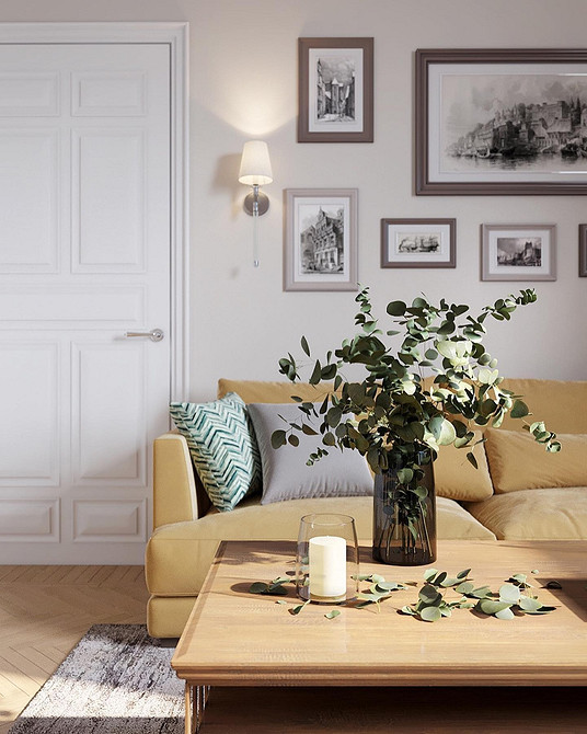 Żółta sofa w salonie Żółta sofa w salonie z dywanem i poduszkami. Inspirujący design wnętrza.